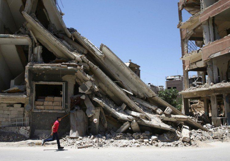 Зруйновані будівлі в районі Дамаску, який контролюється антиурядовими силами. Фото: Reuters